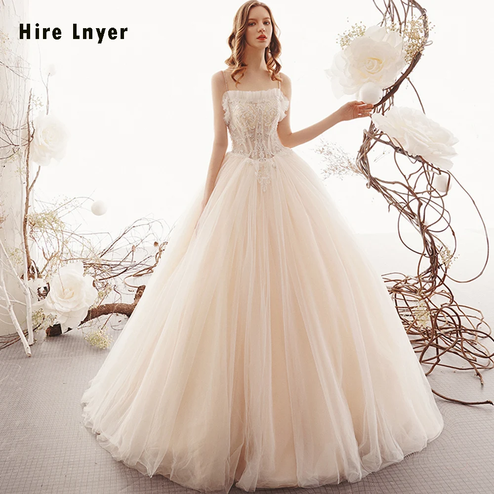 Vestiti Da Sposa Spaghetti Straps Lace Up Back Beading Appliques Illusion Tulle Ball Gown Wedding Dress None Train Wesele
Vestiti Da Sposa Spaghetti Straps Lace Up Back Beading Appliques Illusion Tulle Ball Gown Wedding Dress None Train Wesele