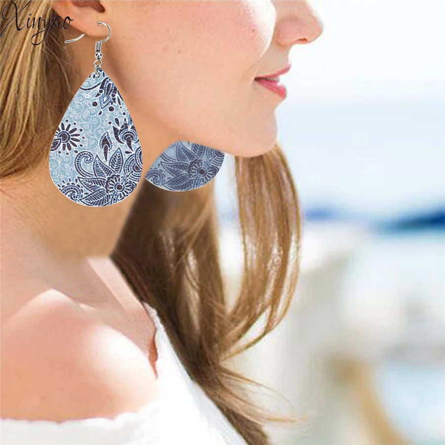 XINYAO Bohemia Feather Leaf Flower Printing Dangle Earrings PU Leather 2019 Boho Water Drop Statement Earrings For Women Brinco
XINYAO Bohemia Feather Leaf Flower Printing Dangle Earrings PU Leather 2019 Boho Water Drop Statement Earrings For Women Brinco