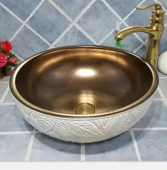 White leaf Europe Style Handmade Round Shape ceramic sink Countertop Ceramic Basin sinks Bathroom Sink
White leaf Europe Style Handmade Round Shape ceramic sink Countertop Ceramic Basin sinks Bathroom Sink