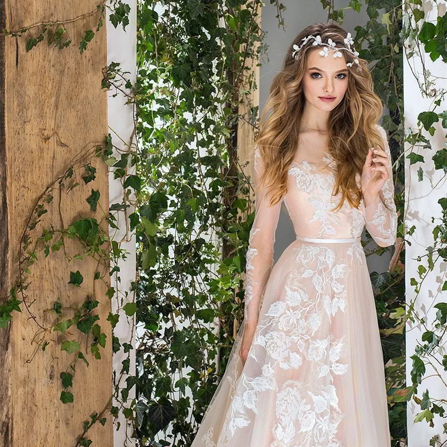 Gentle Tulle Flowers Applique High Neckline A-line Wedding Dress with Bow Belt Back Sweep Train Long Sleeves Bridal Dress
Gentle Tulle Flowers Applique High Neckline A-line Wedding Dress with Bow Belt Back Sweep Train Long Sleeves Bridal Dress