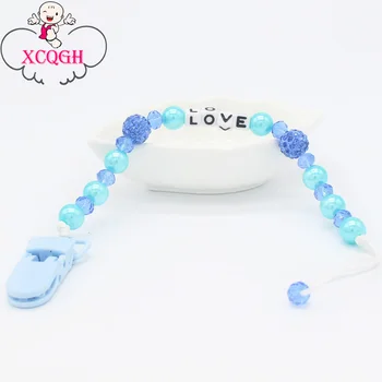 XCQGH Personalized Name Baby Pacifier Holder Clip Soother Clips Dummy Nipple Holder Chain Pearl Beads Attache Sucette
XCQGH Personalized Name Baby Pacifier Holder Clip Soother Clips Dummy Nipple Holder Chain Pearl Beads Attache Sucette
