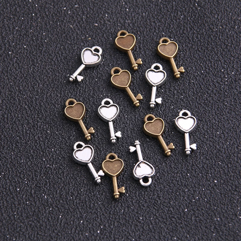36PCS 7*16mm New Product Two Color Small Herat Charms Key Pendant Jewelry Metal Alloy Jewelry Marking
36PCS 7*16mm New Product Two Color Small Herat Charms Key Pendant Jewelry Metal Alloy Jewelry Marking