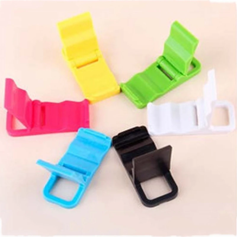 Universal Mini Foldable Multicolour Mount Folding Holder Phone Base Portable Rack Mobile phone Stander For iphone Xiaomi Samsung
Universal Mini Foldable Multicolour Mount Folding Holder Phone Base Portable Rack Mobile phone Stander For iphone Xiaomi Samsung