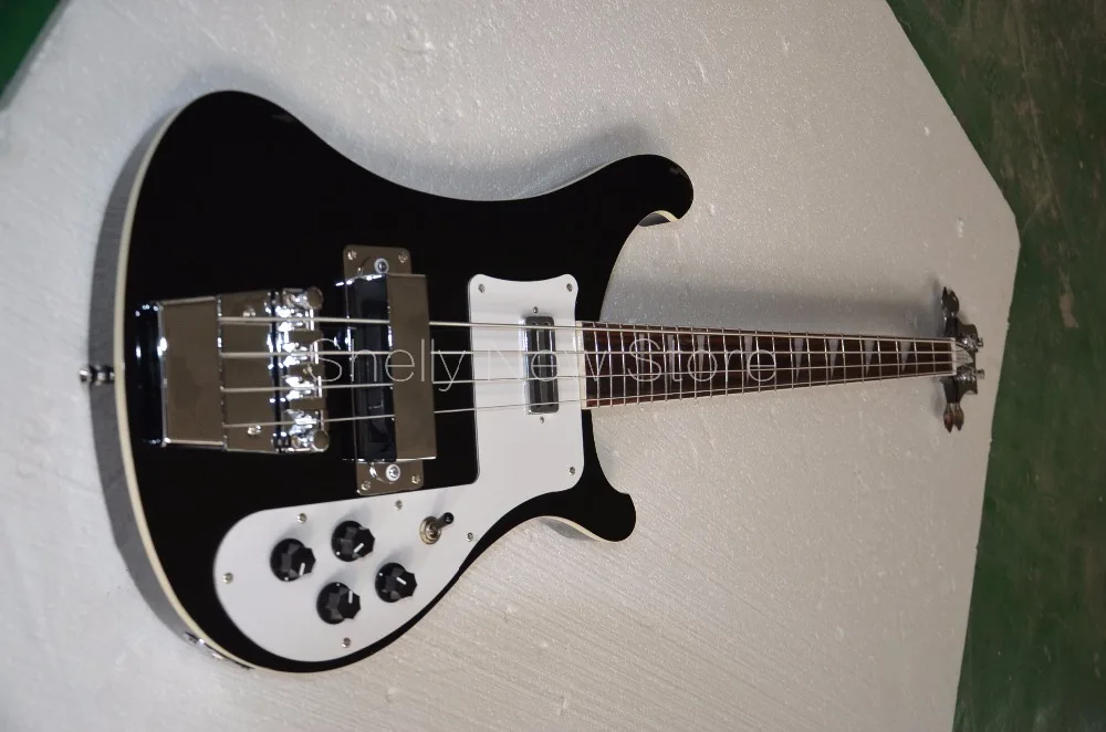 Shelly new store custom black RK 4003 bass 4 strings rick triangle inlay electric bass guitar musical instruments shop
Shelly new store custom black RK 4003 bass 4 strings rick triangle inlay electric bass guitar musical instruments shop