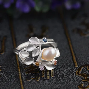 S925 sterling silver inlaid pearls personality simple style beautiful and unique female ring
S925 sterling silver inlaid pearls personality simple style beautiful and unique female ring