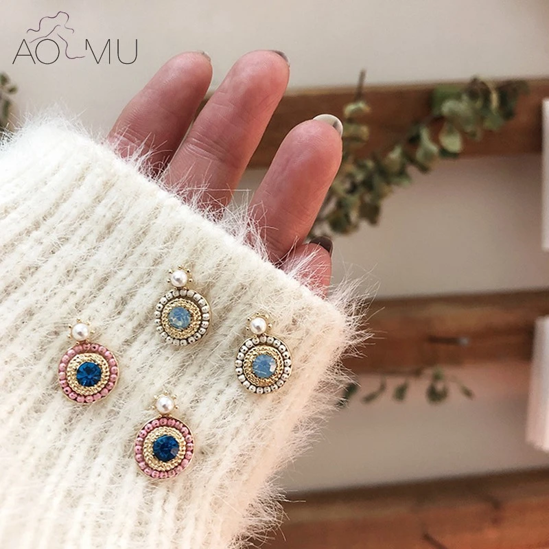 AOMU Korean S925 Sterling Silver Pin Geometry Round Hit Color Crystal Cubic Zirconia Stud Earrings for Women Party Jewelry
AOMU Korean S925 Sterling Silver Pin Geometry Round Hit Color Crystal Cubic Zirconia Stud Earrings for Women Party Jewelry
