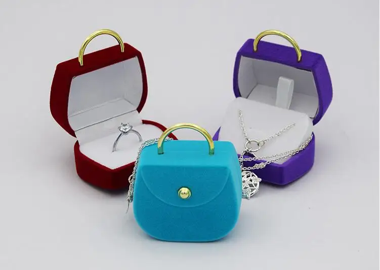 Wholesale Jewelry box packing handbag earring necklace ring packing box square necklace box
Wholesale Jewelry box packing handbag earring necklace ring packing box square necklace box