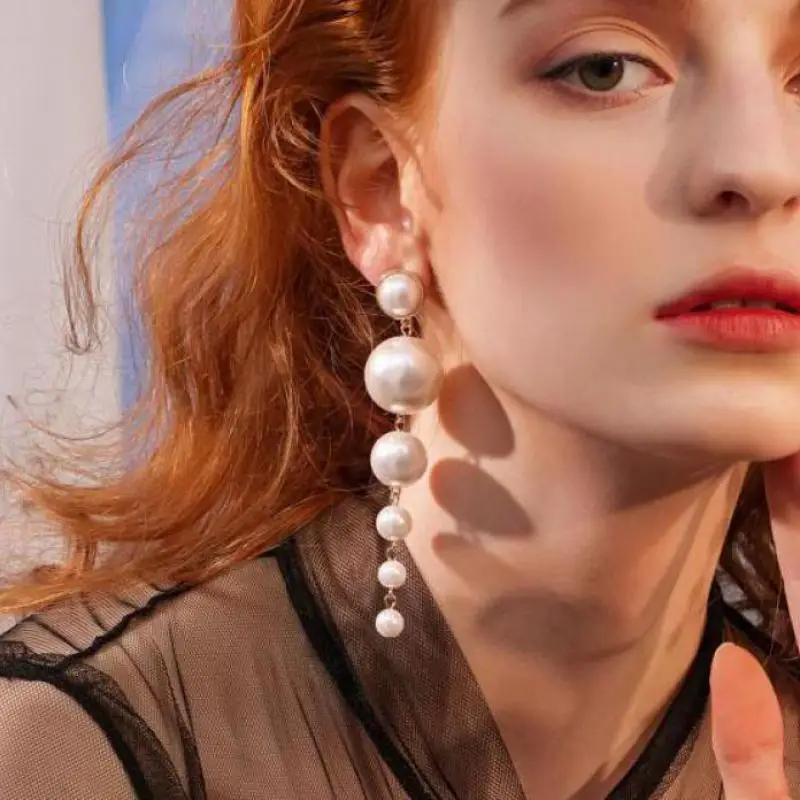 Long Pearl Pendant Stud Earrings For Women Korean Simple Temperament Personality Wild Earrings Brincos Earing Jewelry Oorbellen
Long Pearl Pendant Stud Earrings For Women Korean Simple Temperament Personality Wild Earrings Brincos Earing Jewelry Oorbellen