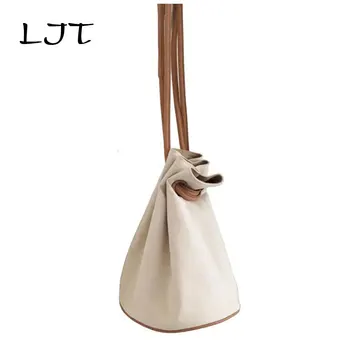 LJT Adjustable Draw Canvas Splicing Bucket Bag Casual Large Capacity Shoulder Bag Women Tote Hand Bag Shopping Bags borsa donna
LJT Adjustable Draw Canvas Splicing Bucket Bag Casual Large Capacity Shoulder Bag Women Tote Hand Bag Shopping Bags borsa donna