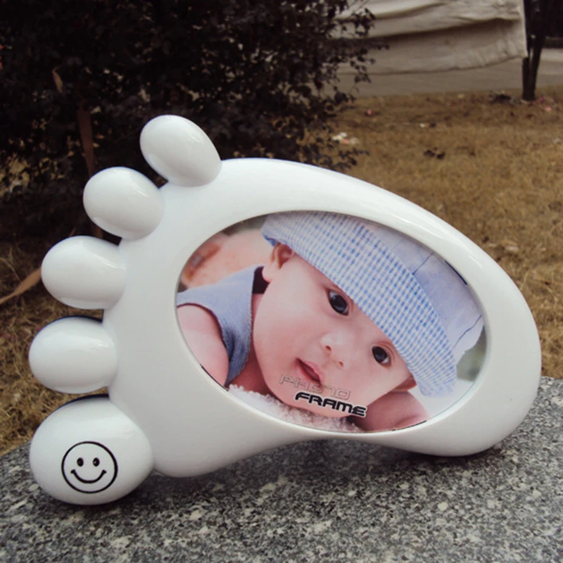 Creative simple big feet 5 - inch photo frame baby photo frame European - style photo frame pavilion, gift frame one pieces
Creative simple big feet 5 - inch photo frame baby photo frame European - style photo frame pavilion, gift frame one pieces