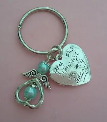ANGEL Wings Heart BABY FEET Key Chain Vintage Silver Charm Keychain For Keys Car DIY Bag Key Ring Handbag Fashion Jewelry NEW
ANGEL Wings Heart BABY FEET Key Chain Vintage Silver Charm Keychain For Keys Car DIY Bag Key Ring Handbag Fashion Jewelry NEW