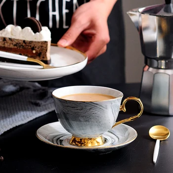 Nordic coffee cup ceramic teacup creative marble pattern gold-rimmed cup and saucer set household drinking cup birthday gifts
Nordic coffee cup ceramic teacup creative marble pattern gold-rimmed cup and saucer set household drinking cup birthday gifts