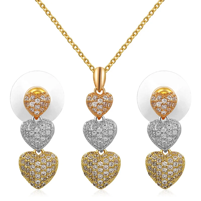 Micro Pave Cubic Zirconia Crystal 3 Heart Connected Pendant Necklace and Earring Jewelry Set in Rose Gold / Silver Colors
Micro Pave Cubic Zirconia Crystal 3 Heart Connected Pendant Necklace and Earring Jewelry Set in Rose Gold / Silver Colors
