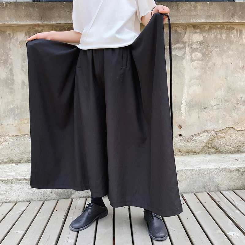 Men Streetwear Hip Hop Loose Casual Wide Leg Skirts Pants Male Ribbons Design Punk Gothic Japan Style Kimono Harem Trousers
Men Streetwear Hip Hop Loose Casual Wide Leg Skirts Pants Male Ribbons Design Punk Gothic Japan Style Kimono Harem Trousers