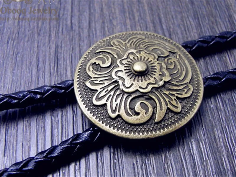 Art Bolo Tie Antique Brass Silver Flower Totem Round Buckle Adjustable Western Cowboy Novelty Ties
Art Bolo Tie Antique Brass Silver Flower Totem Round Buckle Adjustable Western Cowboy Novelty Ties