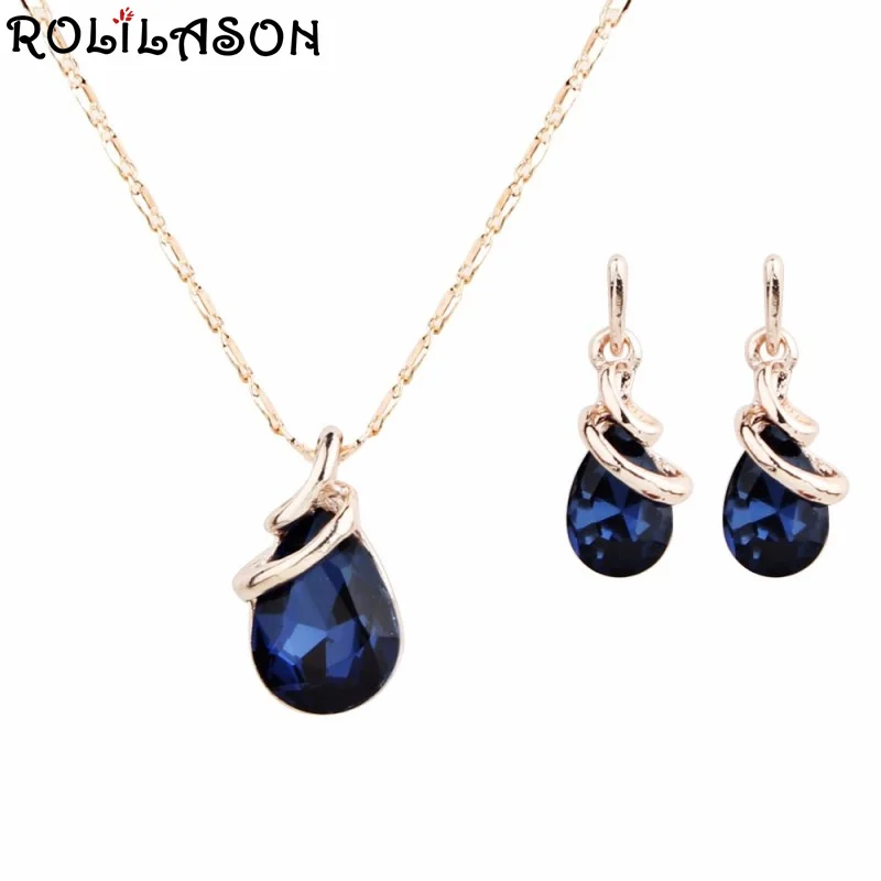 ROLILASON Elegant Water drop shaped blue zircon pendant Champagne gold color chain necklace women earrings set for friends JS822
ROLILASON Elegant Water drop shaped blue zircon pendant Champagne gold color chain necklace women earrings set for friends JS822