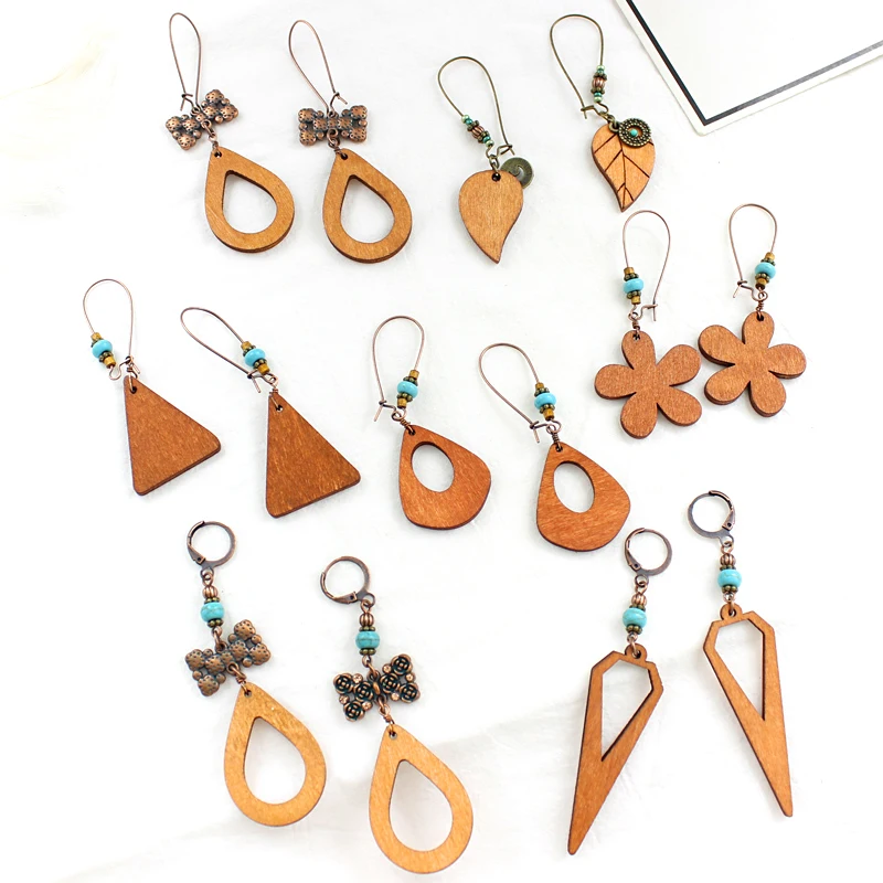 geometric Hollow Elliptical triangle drop petals leaf shape Wooden earring String beads Blue natural stone Temperament earrings
geometric Hollow Elliptical triangle drop petals leaf shape Wooden earring String beads Blue natural stone Temperament earrings