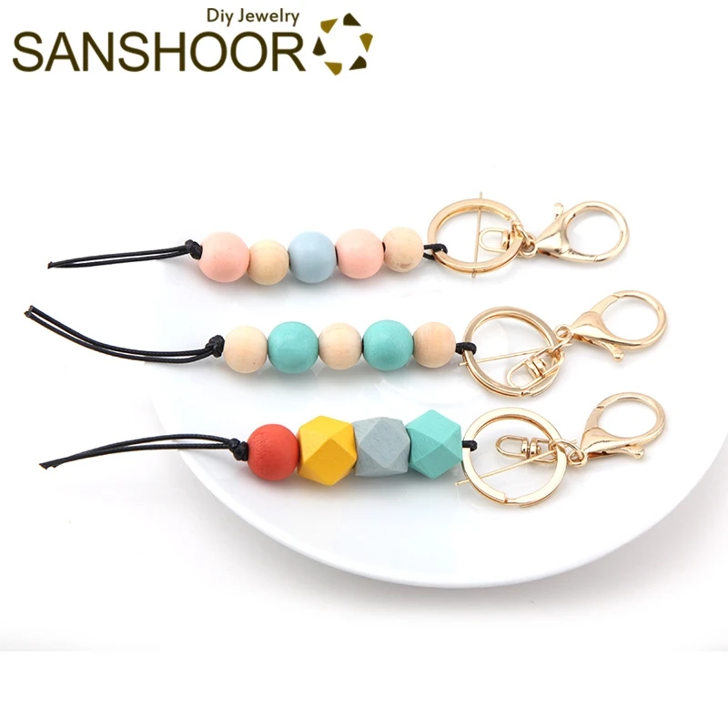 SANSHOOR Rainbow KeyChain Set With Colorful Geometric Round Beads and Black Leather Rope Chain For Women Christmas Gifts 1Pcs
SANSHOOR Rainbow KeyChain Set With Colorful Geometric Round Beads and Black Leather Rope Chain For Women Christmas Gifts 1Pcs