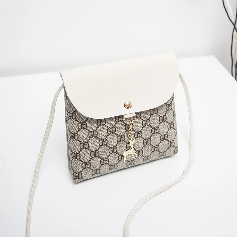 Korean fashion women's bag 2019 new trend single shoulder Messenger bag wild small bag simple small square bag designer handbag 
Korean fashion women's bag 2019 new trend single shoulder Messenger bag wild small bag simple small square bag designer handbag