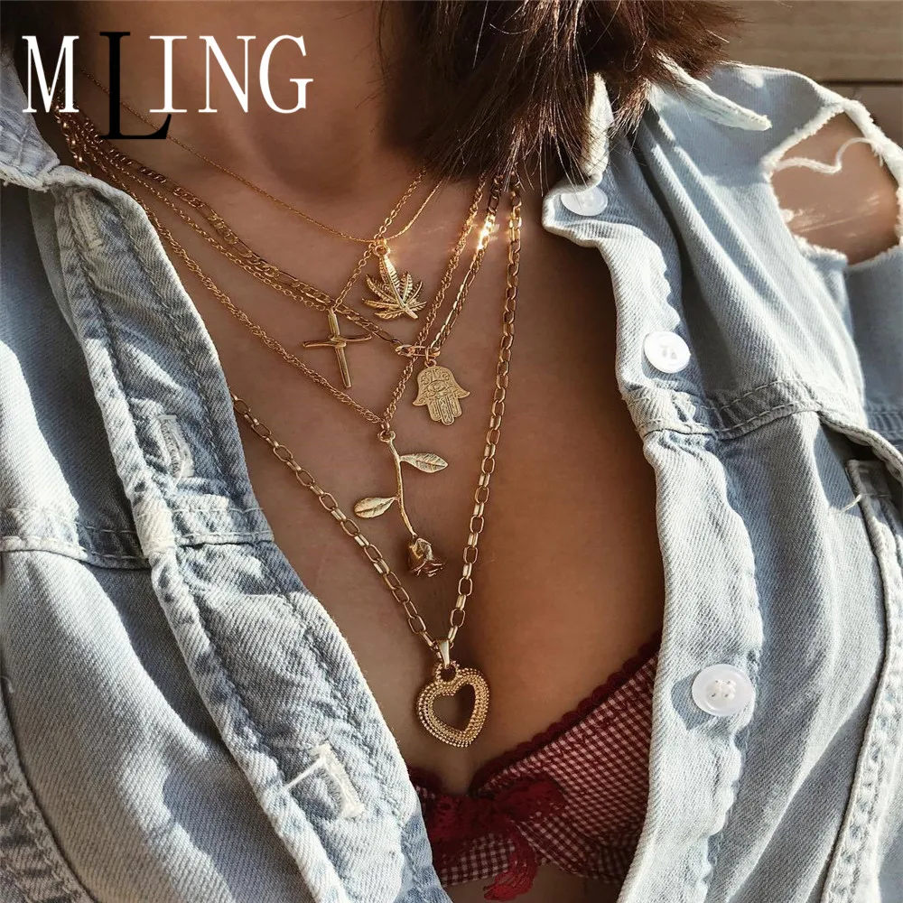 MLING Vintage Gold Multilayer Necklace Bohemian Maple Leaf Cross Rose Flower Fatima Hand Heart Pendant Necklace For Women
MLING Vintage Gold Multilayer Necklace Bohemian Maple Leaf Cross Rose Flower Fatima Hand Heart Pendant Necklace For Women