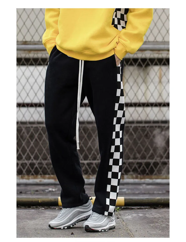Aolamegs Men's casual pants side stripe black white plaid track pants street fashion loose sweatpants drawstring straight pants (10)