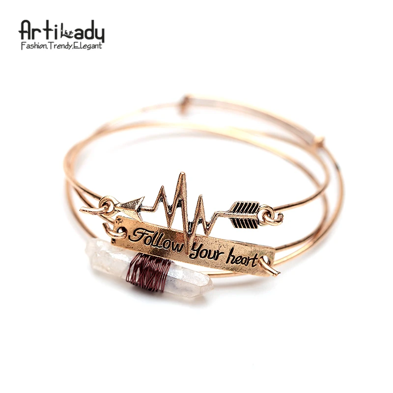 Artilady 3pcs set raw crystal cuff bangle antic gold with follow your heart letters arrow bangle for women jewelry
Artilady 3pcs set raw crystal cuff bangle antic gold with follow your heart letters arrow bangle for women jewelry