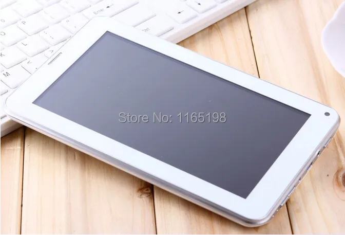 2014-new-7-inch-GSM-Phone-Call-built-in-2g-Tablet-PC-Webcam-Android-computer-Tablet (1) - .jpg