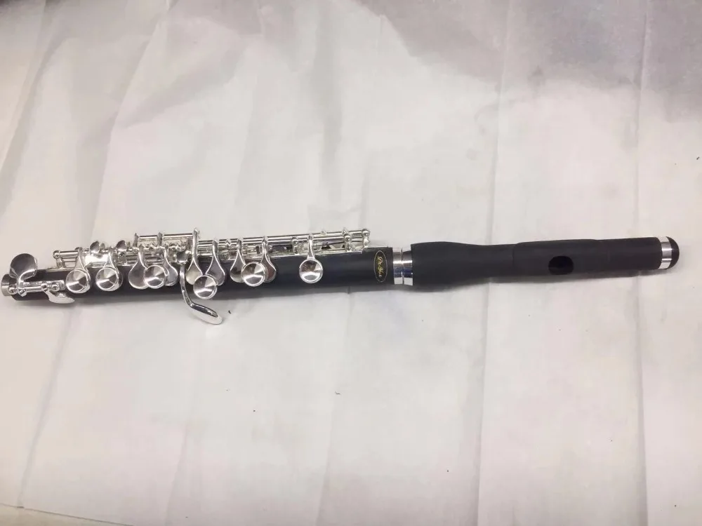 New Western musical instrument synthetic wood Piccolo C, primary essential, E key DEYUE Musical instrument piccolo flute
New Western musical instrument synthetic wood Piccolo C, primary essential, E key DEYUE Musical instrument piccolo flute