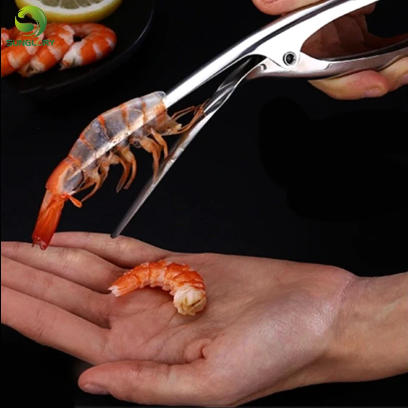 1PC Shrimp Peeler Stainless Steel Prawn Peeler Remover Shrimp Deveiner Peel Device Knife Creative Kitchen Gadgets Seafood Tools 
1PC Shrimp Peeler Stainless Steel Prawn Peeler Remover Shrimp Deveiner Peel Device Knife Creative Kitchen Gadgets Seafood Tools