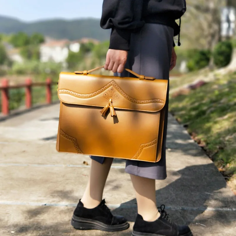 Vintage Literary Hollow out Tassels Women Handbag Big 14" Laptop Bag A4 Thin Document Bag Dress OL Fashion Business Briefcase
Vintage Literary Hollow out Tassels Women Handbag Big 14" Laptop Bag A4 Thin Document Bag Dress OL Fashion Business Briefcase