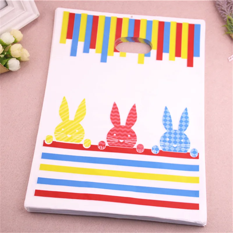 New Design Wholesale 100pcs/lot 25*35cm Lovely Rabbit Packaging Bags With Handles Plastic Christmas New Year Sachet Cadeau
New Design Wholesale 100pcs/lot 25*35cm Lovely Rabbit Packaging Bags With Handles Plastic Christmas New Year Sachet Cadeau