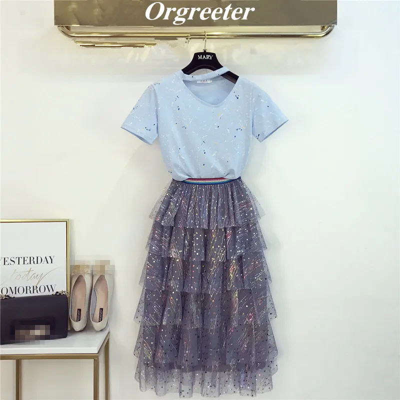 Women Summer Hollow Print T-Shirt and Rainbow Striped Patchwork Sequined Mesh Skirt Set Cascading Ruffles Midi Skirt 2 piece Set
Women Summer Hollow Print T-Shirt and Rainbow Striped Patchwork Sequined Mesh Skirt Set Cascading Ruffles Midi Skirt 2 piece Set