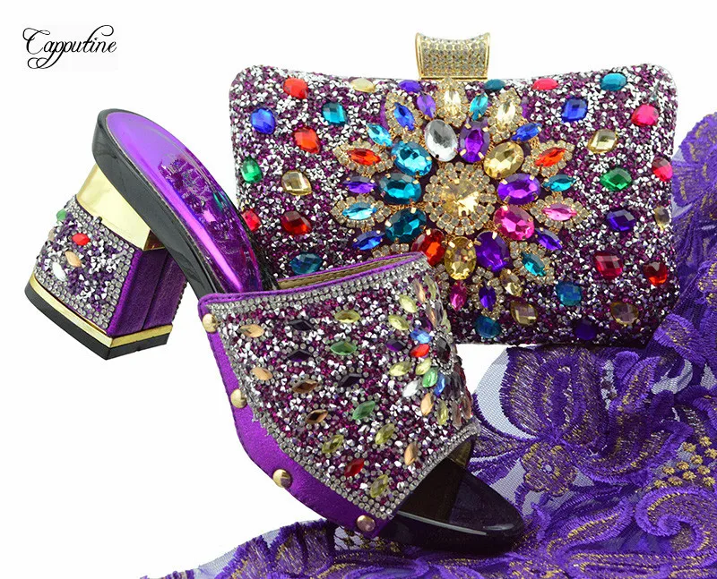 Gorgeous puple sandals with purse sets with rhinestones African high heel shoes and handbag sets for lady FGT004 heel height 7cm
Gorgeous puple sandals with purse sets with rhinestones African high heel shoes and handbag sets for lady FGT004 heel height 7cm