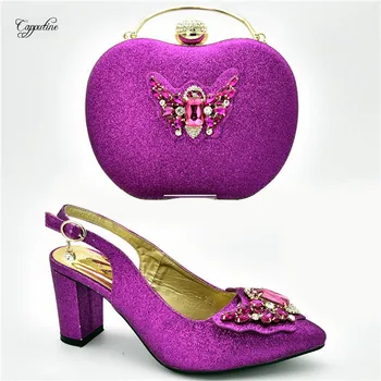 Latest magenta color lady sandal shoes with party bag sets with nice stones 108-3 heel height 7cm
Latest magenta color lady sandal shoes with party bag sets with nice stones 108-3 heel height 7cm