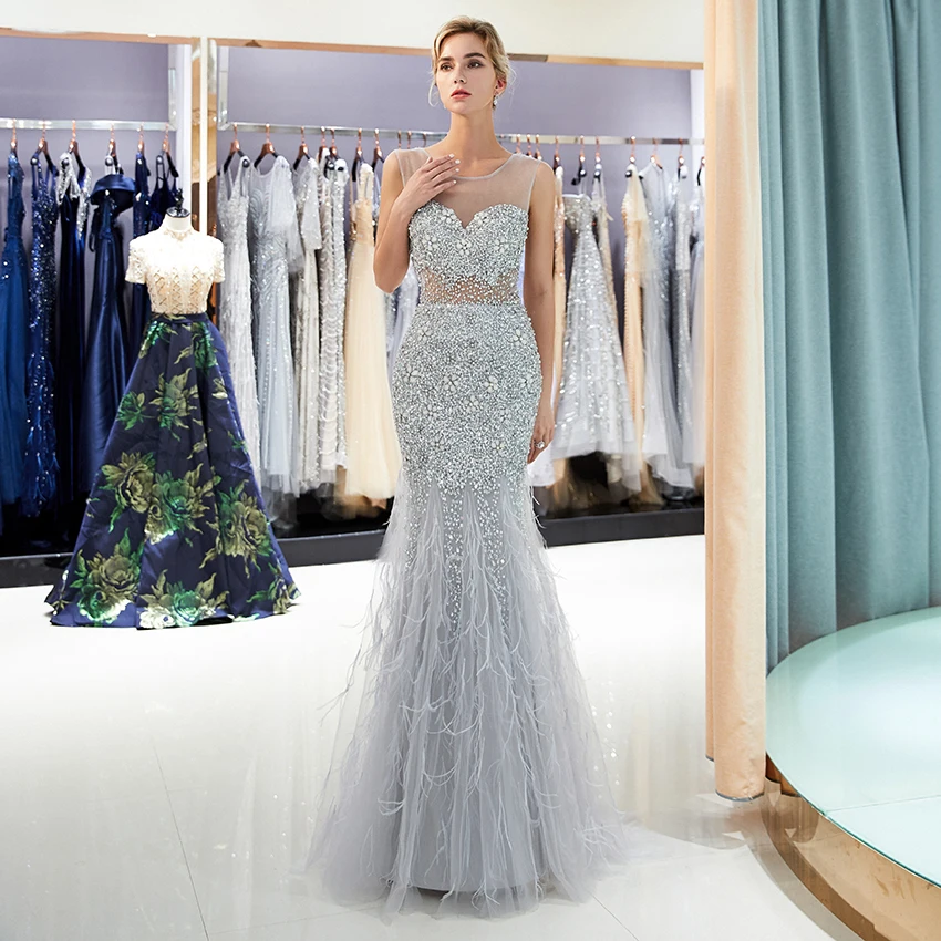 Luxury Crystal Prom Gown Scoop Neckline Mermaid Silver Beaded Women Party Dresses 2019 Feather Evening Gown
Luxury Crystal Prom Gown Scoop Neckline Mermaid Silver Beaded Women Party Dresses 2019 Feather Evening Gown
