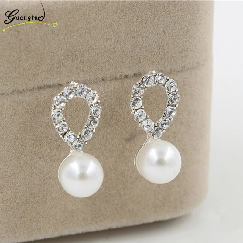 New Brand Imitation Pearl Waterdrops Shape Stud Earrings For Women Silver Color Rhinestone Piercing Earring Bijoux Brincos
New Brand Imitation Pearl Waterdrops Shape Stud Earrings For Women Silver Color Rhinestone Piercing Earring Bijoux Brincos