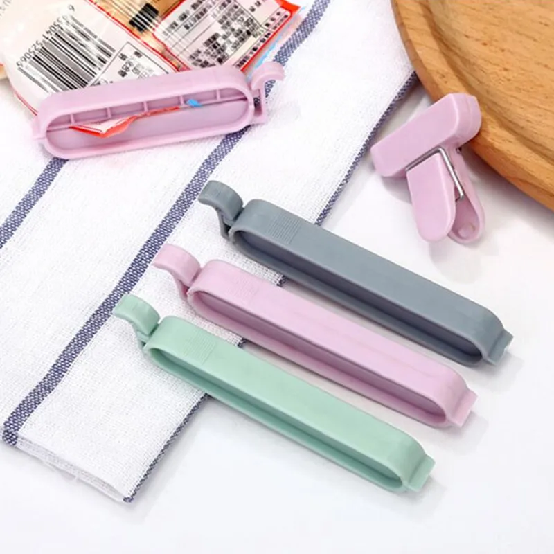 

12Pcs/set Plastic Bag Sealer Snack Fresh Food Storage Bag Clips Vacuum Sealer Clamp Kitchen Tool Home Food Close Clip Seal