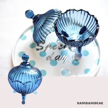 Crystal blue glass can with cover small candy jar storage tank tableware decorative tank little glass jar for Sugar cube
Crystal blue glass can with cover small candy jar storage tank tableware decorative tank little glass jar for Sugar cube