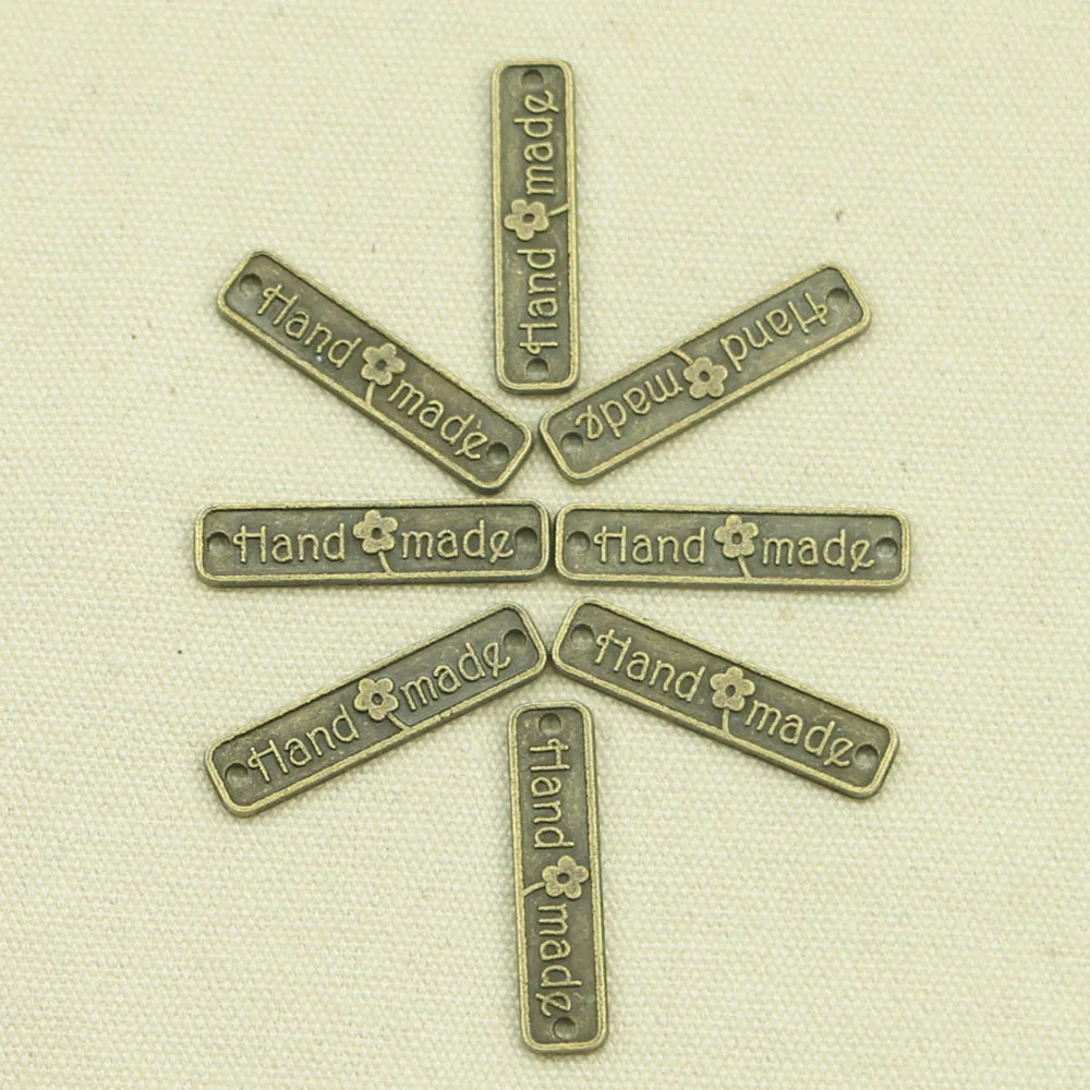 35pcs Tibetan BRONZE Plated plates hand made Charms Pendants for Jewelry Making DIY Handmade Craft 2.5*0.6cm
35pcs Tibetan BRONZE Plated plates hand made Charms Pendants for Jewelry Making DIY Handmade Craft 2.5*0.6cm