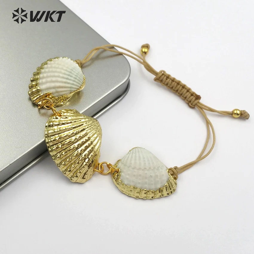 WKT WT-B440 Classic shell bracelet bohemian style ladies gold trim handmade white scallop shell bracelet jewelry
WKT WT-B440 Classic shell bracelet bohemian style ladies gold trim handmade white scallop shell bracelet jewelry