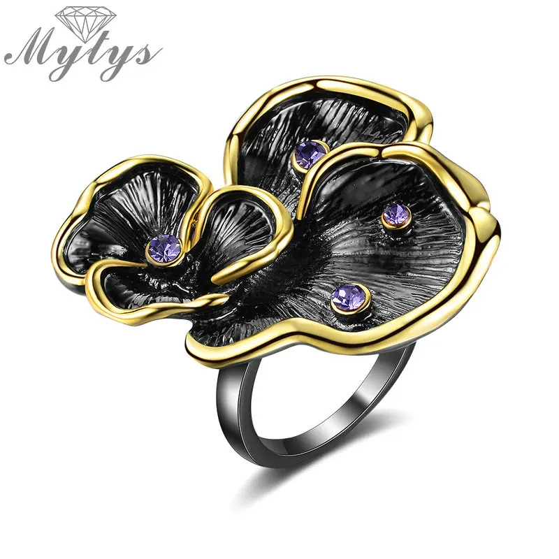 Mytys Black Gun Vintage Flower Ring for Women Retro Statement Ring Yellow Gold Lace Purple Tiny Crystal Antique Jewelry R2135
Mytys Black Gun Vintage Flower Ring for Women Retro Statement Ring Yellow Gold Lace Purple Tiny Crystal Antique Jewelry R2135