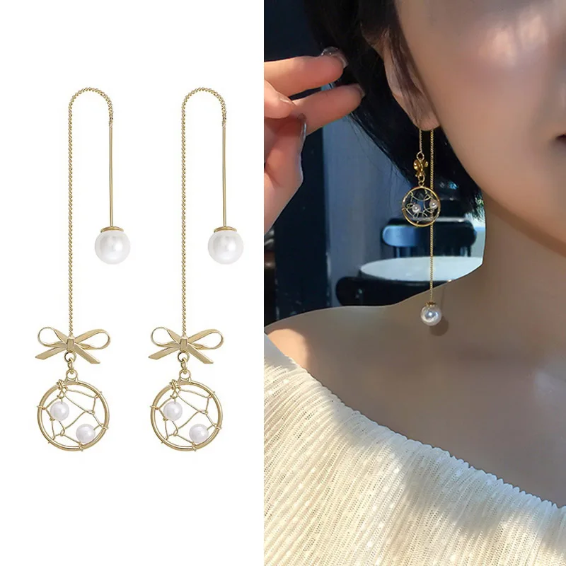 Japan and South Korea version of the temperament 2019 new bow pearl long tassel ear line dream catcher earrings
Japan and South Korea version of the temperament 2019 new bow pearl long tassel ear line dream catcher earrings