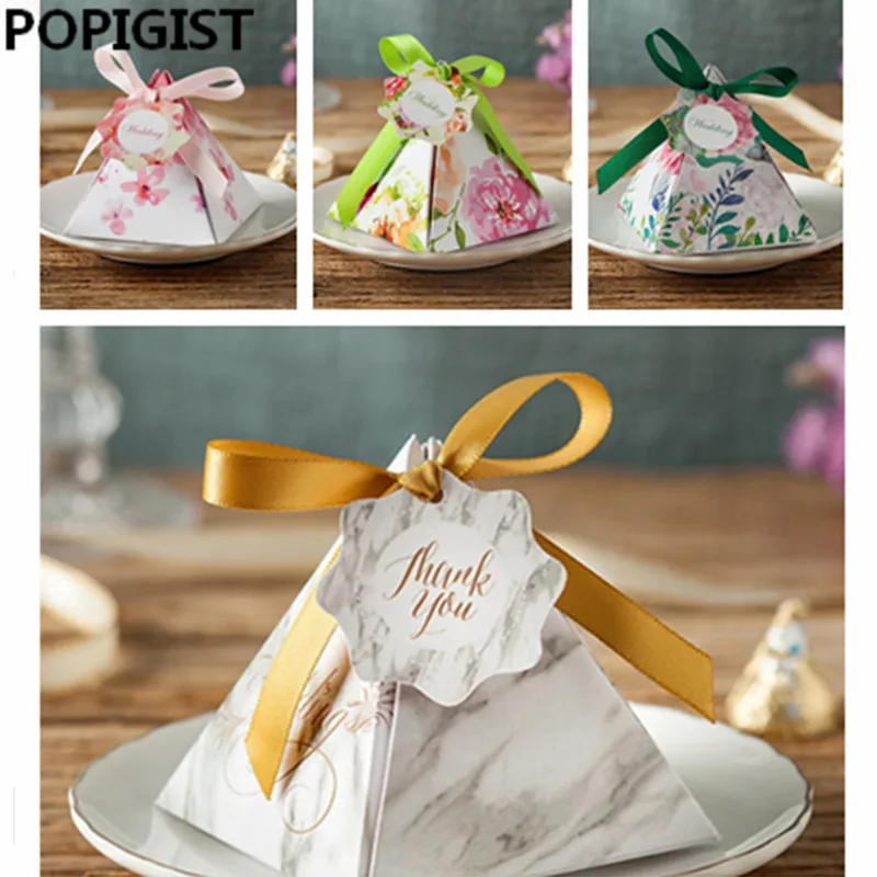 Pink /Blue/Green Floral Triangular Pyramid Wedding Favors Candy Boxes Bridal Shower Party Paper Gift Box 50pcs
Pink /Blue/Green Floral Triangular Pyramid Wedding Favors Candy Boxes Bridal Shower Party Paper Gift Box 50pcs
