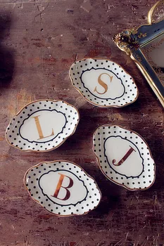 Gold-rimmed ceramic dish striped ring jewelry receiving soap tray lovely home decoration
Gold-rimmed ceramic dish striped ring jewelry receiving soap tray lovely home decoration