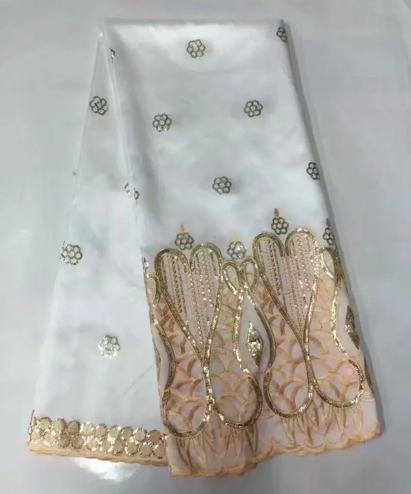 African gold george fabric with gold sequins latest embroidery george lace fabric for wedding dress white nigeria lace fabrics
African gold george fabric with gold sequins latest embroidery george lace fabric for wedding dress white nigeria lace fabrics