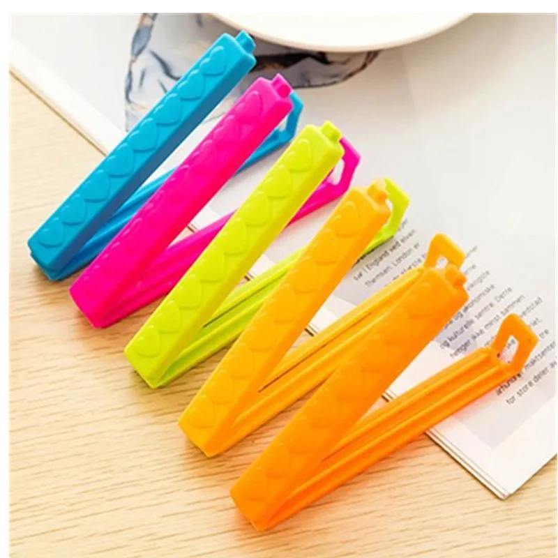 5Pcs/Lot New Househould Food Snack Storage Seal Sealing Bag Clips Sealer Clamp Food Bag Clips Kitchen Tool Home Food Close Clip
5Pcs/Lot New Househould Food Snack Storage Seal Sealing Bag Clips Sealer Clamp Food Bag Clips Kitchen Tool Home Food Close Clip