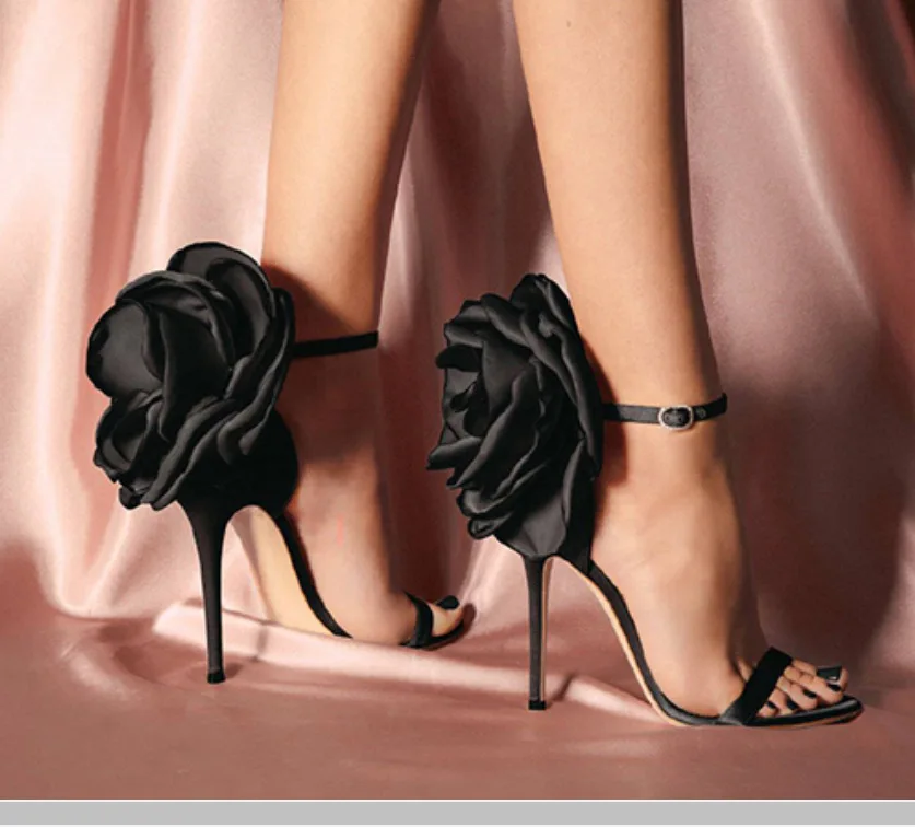 2019 spring and summer new large flower sandals women's word buckle high heel satin black female shoes.
2019 spring and summer new large flower sandals women's word buckle high heel satin black female shoes.