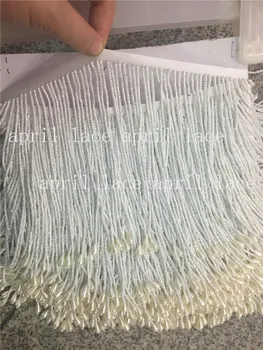 A003 # ivory 10 yards/bag 15 cm width beads ribbon fringe tassel for garment/decorative/wedding bridal gown dress
A003 # ivory 10 yards/bag 15 cm width beads ribbon fringe tassel for garment/decorative/wedding bridal gown dress