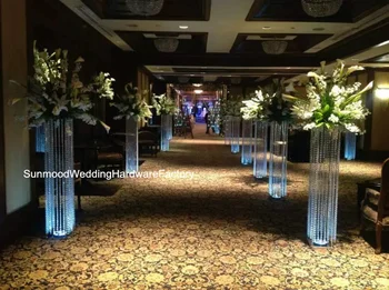 silver flower arrangement stands with crystal chandelier centerpiece
silver flower arrangement stands with crystal chandelier centerpiece