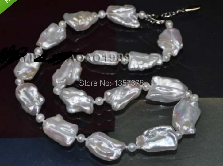 shitou 004077 Rare Natural 20 inch 20-26mm Baroque cultured freshwater pearl necklace
shitou 004077 Rare Natural 20 inch 20-26mm Baroque cultured freshwater pearl necklace
